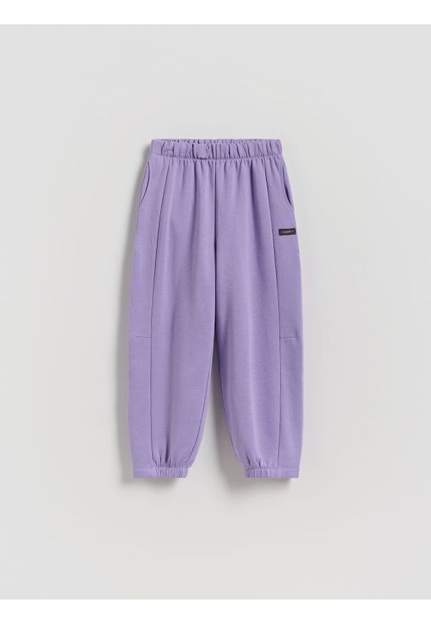 Reserved - Spodnie dresowe - fioletowy. Kolor: fioletowy. Materiał: dresówka