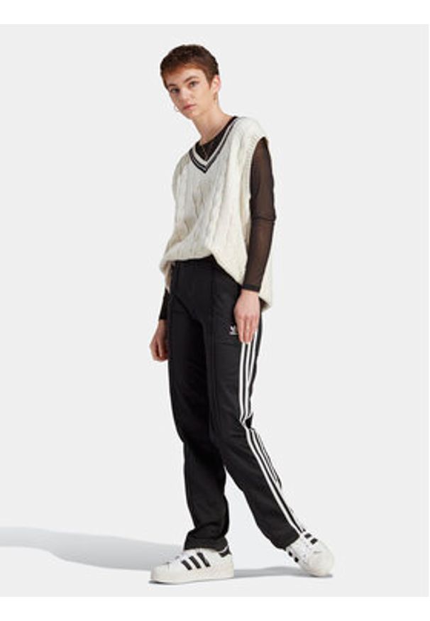 Adidas - adidas Spodnie dresowe adicolor Classics Firebird IL8763 Czarny Regular Fit. Kolor: czarny. Materiał: syntetyk