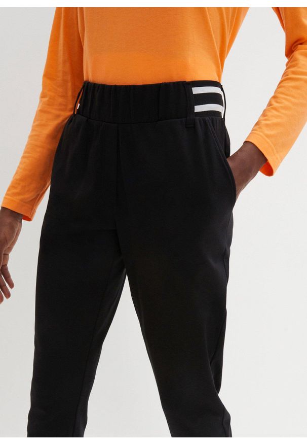 bonprix - Spodnie z czystej bawełny organicznej. Kolor: czarny. Materiał: bawełna. Wzór: paski