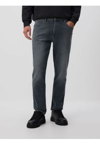 Reserved - Jeansy slim fit z efektem sprania - granatowy. Kolor: niebieski
