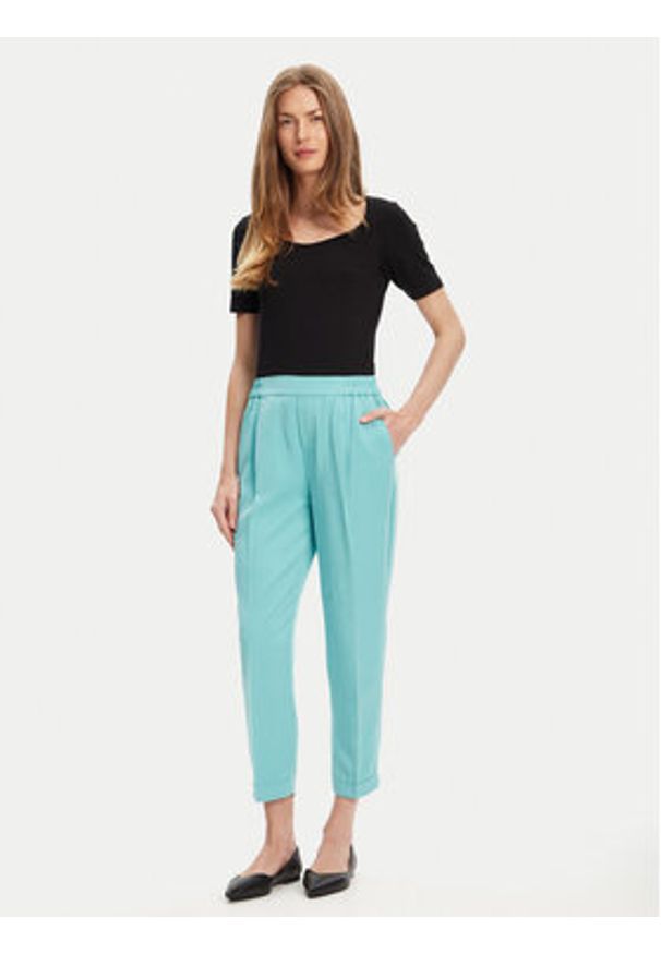 United Colors of Benetton - United Colors Of Benetton Spodnie materiałowe 4Y09DF079 Zielony Regular Fit. Kolor: zielony. Materiał: lyocell