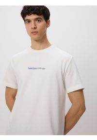 Reserved - T-shirt comfort z nadrukiem - złamana biel. Materiał: bawełna, dzianina. Wzór: nadruk