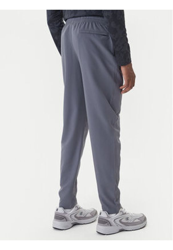Under Armour Spodnie dresowe Unstoppable 6003861 Szary Loose Fit. Kolor: szary. Materiał: syntetyk