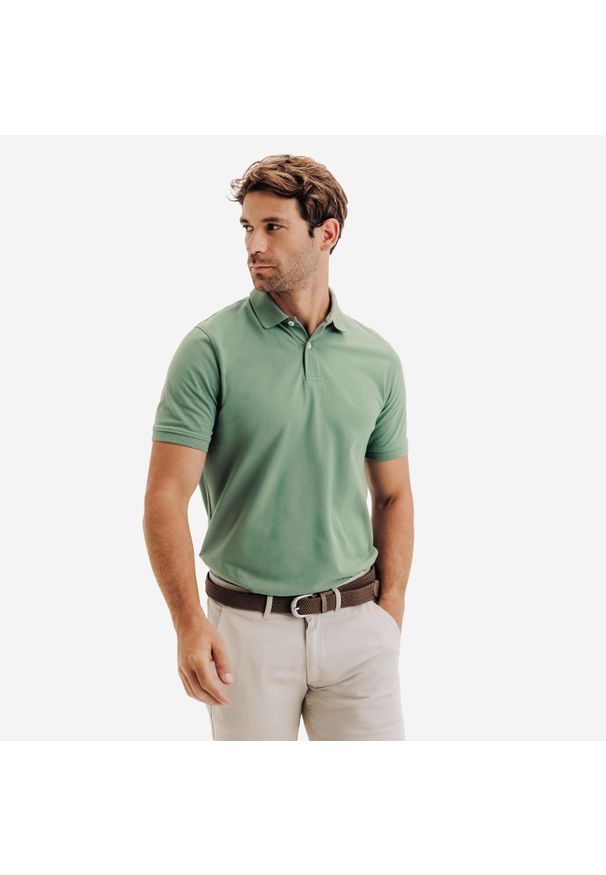 INESIS - Koszulka polo do golfa z krótkim rękawem męska Inesis MW500. Typ kołnierza: polo, golf. Kolor: zielony. Materiał: poliester, bawełna, materiał. Długość rękawa: krótki rękaw. Długość: krótkie. Wzór: ze splotem. Styl: klasyczny, sportowy