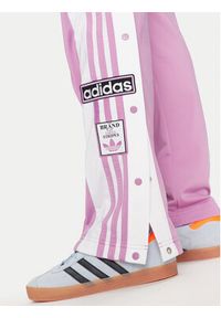 Adidas - adidas Spodnie dresowe Adibreak IY2129 Fioletowy Loose Fit. Kolor: fioletowy. Materiał: syntetyk