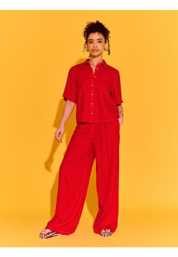 Sinsay - Spodnie wide leg z domieszką lnu - pomarańczowy. Kolor: pomarańczowy