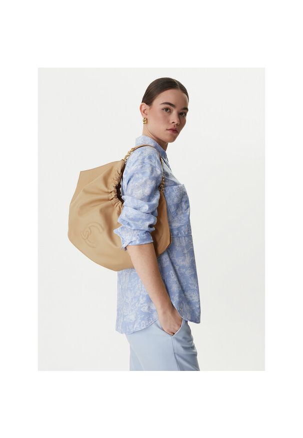 Torebka Coccinelle. Kolor: beżowy