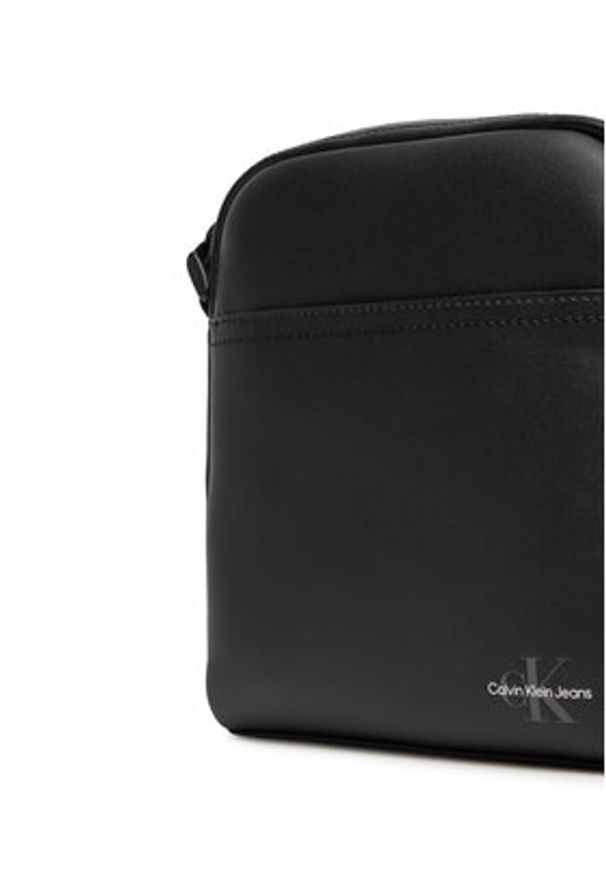 Calvin Klein Jeans Saszetka Mono Logo Reporter 18 LV04G3014G Czarny. Kolor: czarny. Materiał: skóra
