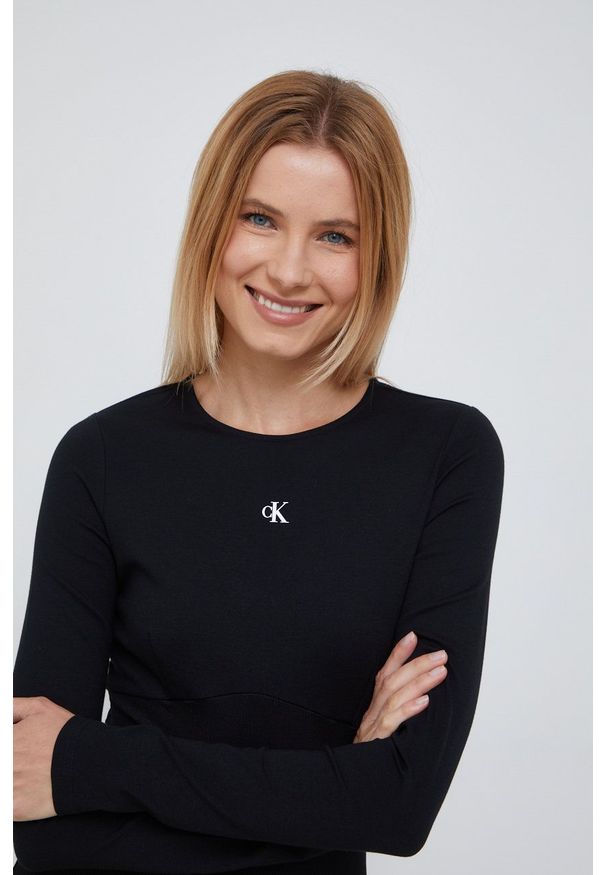 Calvin Klein Jeans sukienka kolor czarny mini dopasowana. Kolor: czarny. Materiał: dzianina. Wzór: gładki. Typ sukienki: dopasowane. Długość: mini