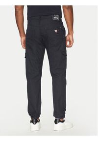 Guess Spodnie materiałowe M5RB54 WGXY1 Granatowy Slim Fit. Kolor: niebieski. Materiał: bawełna #4