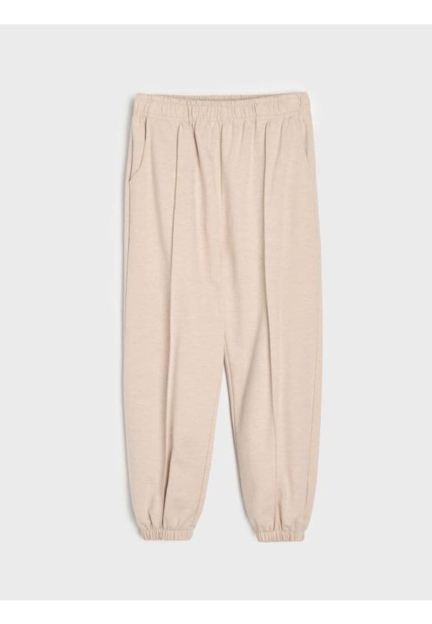 Sinsay - Spodnie dresowe balloon - beżowy. Kolor: beżowy. Materiał: dresówka
