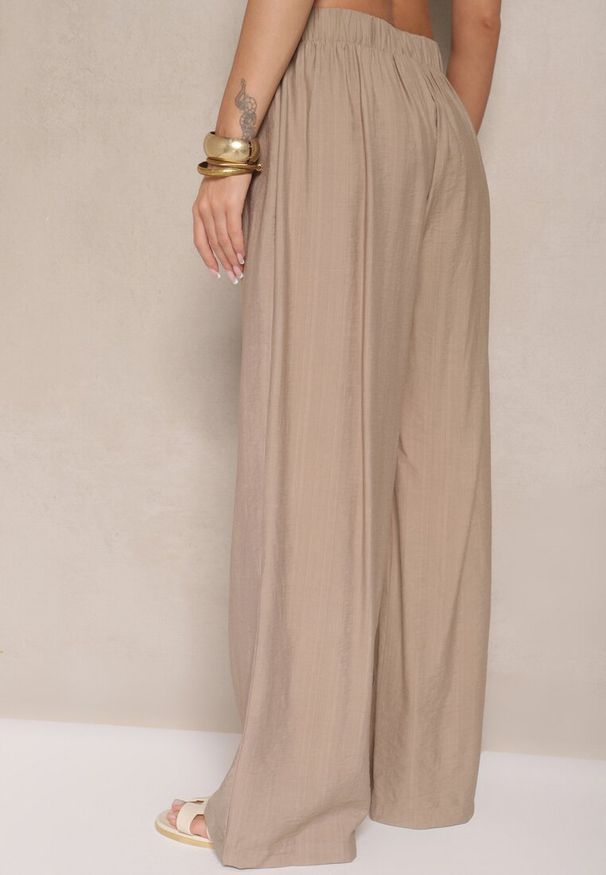 Renee - Ciemnobeżowe Spodnie z Wiskozy o Szerokim Kroju z Kokardą Ellioria. Okazja: na co dzień, na spacer. Kolor: beżowy. Materiał: wiskoza. Styl: casual, elegancki