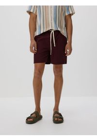 Reserved - Szorty z domieszką lnu - mahoniowy. Kolor: brązowy. Materiał: len #1