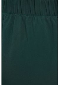 GAP Spodnie dwustronne damskie kolor zielony joggery medium waist. Kolor: zielony. Materiał: materiał #8