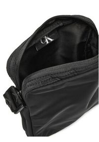 Calvin Klein Jeans Saszetka Over Webbing K50K512567 Czarny. Kolor: czarny. Materiał: materiał