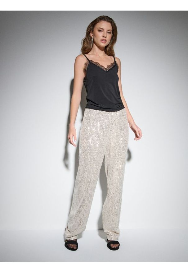 Sinsay - Spodnie wide leg z połyskującymi cekinami - srebrny. Kolor: srebrny