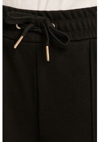 Armani Exchange - Spodnie. Kolor: czarny. Materiał: bawełna, poliester, materiał, dzianina. Wzór: aplikacja #6