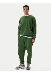 New Balance Spodnie dresowe MP41508 Zielony Relaxed Fit. Kolor: zielony. Materiał: bawełna #4