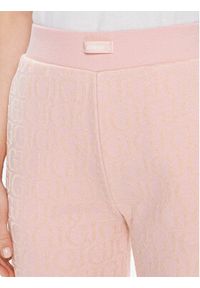 Guess Spodnie dresowe Logo V4RB13 KC2W0 Różowy Relaxed Fit. Kolor: różowy. Materiał: bawełna