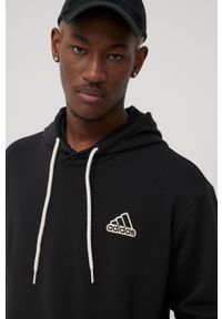 Adidas - adidas bluza męska kolor czarny z kapturem z aplikacją. Typ kołnierza: kaptur. Kolor: czarny. Materiał: bawełna. Wzór: aplikacja