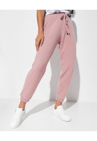 MONCLER - Różowe spodnie dresowe z wełny i kaszmiru. Kolor: wielokolorowy, fioletowy, różowy. Materiał: kaszmir, wełna, dresówka