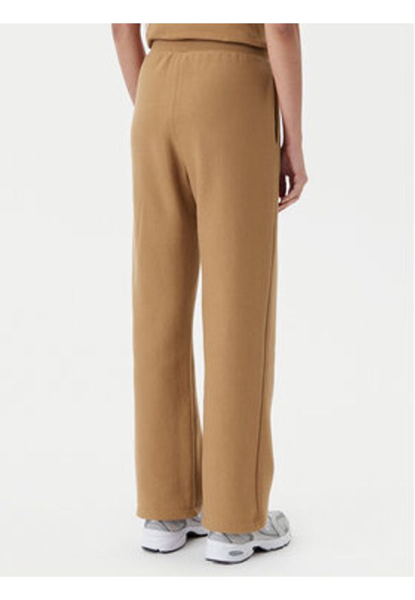 Champion Spodnie dresowe 117983 Brązowy Slim Fit. Kolor: brązowy. Materiał: bawełna