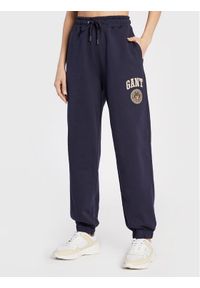 GANT - Gant Spodnie dresowe Crest Shield 4203916 Granatowy Relaxed Fit. Kolor: niebieski. Materiał: bawełna, dresówka