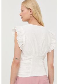 Bruuns Bazaar bluzka bawełniana damska kolor biały gładka. Okazja: na co dzień. Kolor: biały. Materiał: bawełna. Długość rękawa: na ramiączkach. Długość: krótkie. Wzór: gładki. Styl: casual