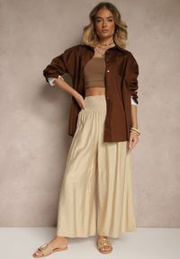 Renee - Beżowe Spodnie z Wiskozą o Szerokim Kroju High Waist Orrana. Okazja: na co dzień. Stan: podwyższony. Kolor: beżowy. Materiał: wiskoza. Styl: elegancki, casual