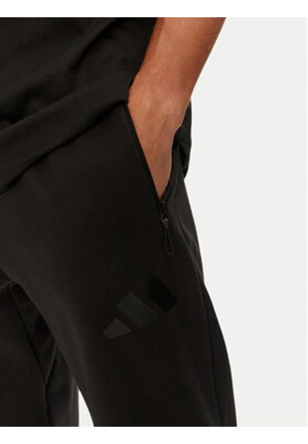 Adidas - adidas Spodnie dresowe Z.N.E. JD9599 Czarny Regular Fit. Kolor: czarny. Materiał: syntetyk, bawełna