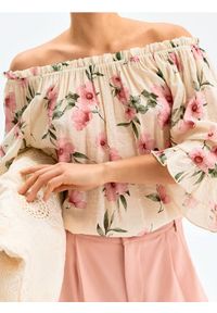 Sinsay - Wiskozowa bluzka z falbankami w kwiaty - wielobarwny. Typ kołnierza: kołnierz z falbankami. Materiał: wiskoza. Wzór: kwiaty #1