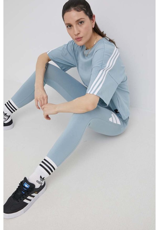 adidas Performance legginsy damskie z nadrukiem. Kolor: niebieski. Materiał: dzianina, materiał. Wzór: nadruk