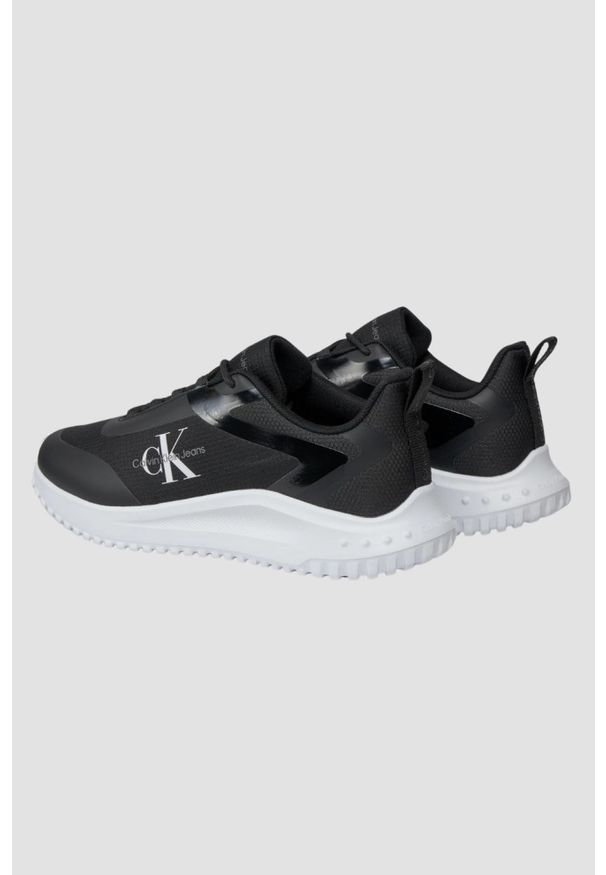 Calvin Klein - CALVIN KLEIN Czarne sneakersy męskie z białą podeszwą. Kolor: czarny