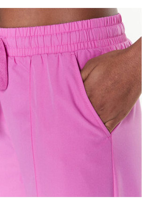 United Colors of Benetton - United Colors Of Benetton Spodnie materiałowe 40K6DF035 Różowy Relaxed Fit. Kolor: różowy. Materiał: materiał, syntetyk