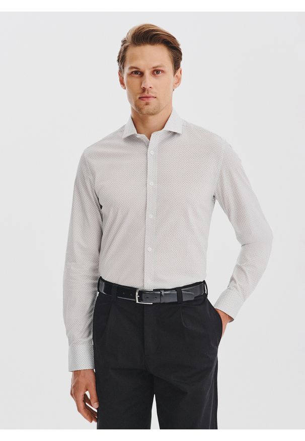 Pako Lorente - PAKO LORENTE - Biała koszula męska w mikrowzór. Kolor: biały. Materiał: bawełna, elastan. Długość rękawa: długi rękaw. Długość: długie