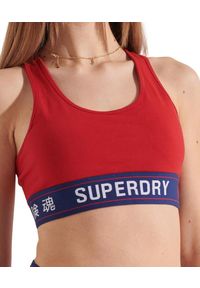 Biustonosz sportowy damski Superdry. Kolor: czerwony. Materiał: elastan, bawełna