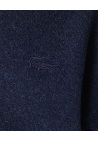 Lacoste - LACOSTE - Granatowy sweter z wełny z logo. Typ kołnierza: golf. Kolor: niebieski. Materiał: wełna. Wzór: haft. Styl: klasyczny