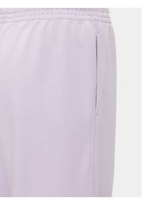 Calvin Klein Jeans Spodnie dresowe Monologo LV047B235G Fioletowy Regular Fit. Kolor: fioletowy. Materiał: bawełna #4