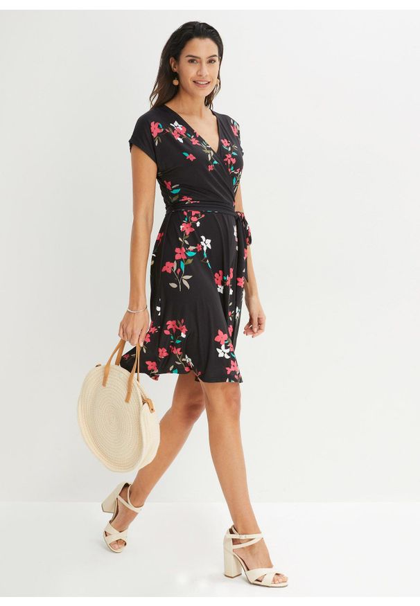 bonprix - Sukienka z dżerseju z efektem założenia kopertowego. Kolor: czarny. Materiał: jersey. Wzór: nadruk. Typ sukienki: dopasowane, kopertowe