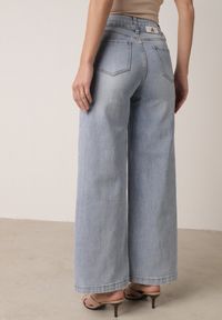 Born2be - Niebieskie Szerokie Jeansy z Bawełną z Wysokim Stanem i Denimowym Paskiem Venwyn. Okazja: na co dzień, na spotkanie biznesowe, do pracy. Stan: podwyższony. Kolor: niebieski. Styl: casual, biznesowy, elegancki #6