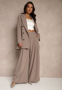 Renee - Jasnobrązowe Eleganckie Spodnie Palazzo z Szerokimi Nogawkami Adivisa. Stan: podwyższony. Kolor: beżowy. Styl: elegancki #1