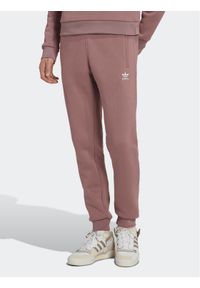 Adidas - adidas Spodnie dresowe adicolor Essentials Trefoil HK0105 Różowy Slim Fit. Kolor: różowy. Materiał: dresówka, bawełna