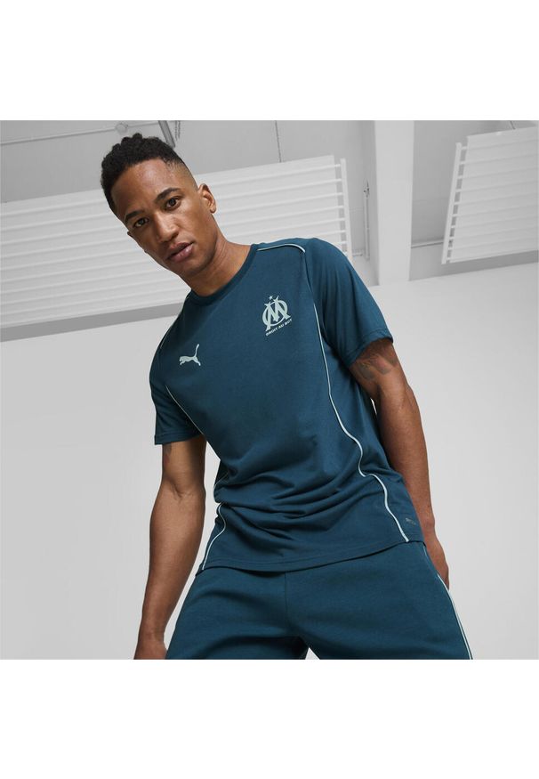 Puma - Męska koszulka Casuals Olympique Marsylia PUMA Ocean Tropic Turquoise Surf Blue. Kolor: niebieski. Sport: piłka nożna