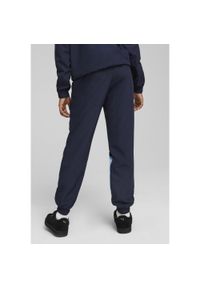 Puma - Młodzieżowe spodnie Manchester City ftblARCHIVE PUMA Navy Team Light Blue. Kolor: niebieski