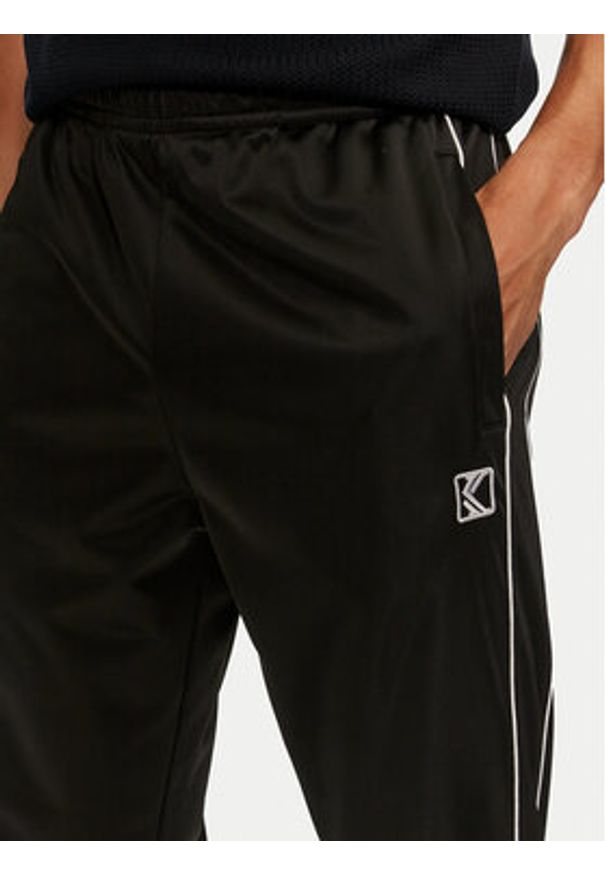 Karl Kani Spodnie dresowe 60030049 Czarny Regular Fit. Kolor: czarny. Materiał: syntetyk