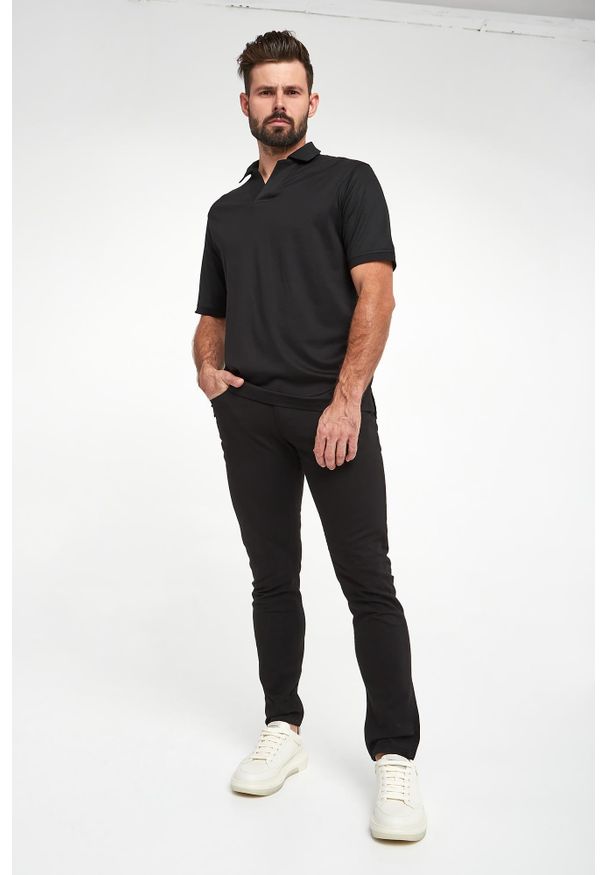 Emporio Armani - Polo męskie EMPORIO ARMANI. Typ kołnierza: polo