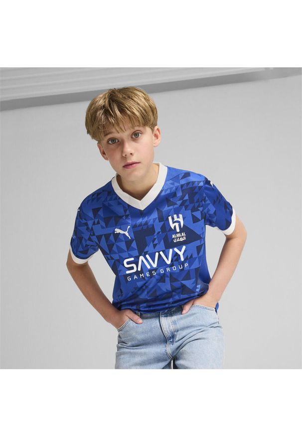Puma - Al Hilal Saudi F.C. Młodzieżowa koszulka domowa Stade Rennais F.C. 24/25 PUMA. Kolor: niebieski, wielokolorowy, biały. Wzór: aplikacja. Sport: piłka nożna