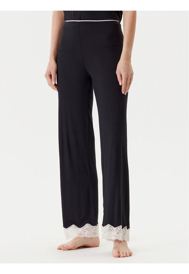 United Colors of Benetton - United Colors Of Benetton Spodnie piżamowe 3Z123F04A Czarny Regular Fit. Kolor: czarny. Materiał: wiskoza