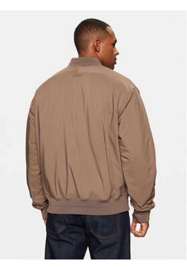 Calvin Klein Kurtka bomber Hero 00040EM567 Beżowy Regular Fit. Kolor: beżowy. Materiał: syntetyk