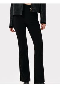 Sinsay - Spodnie flare - czarny. Kolor: czarny #1